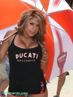 2007 Red Bull U.S. Grand Prix - Ducati Island Umbrella Girl: The Ducati Umbrella Girl striking a pose for RoadCarvin' camera.
